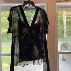 Womens top with tie back and built in black cami.